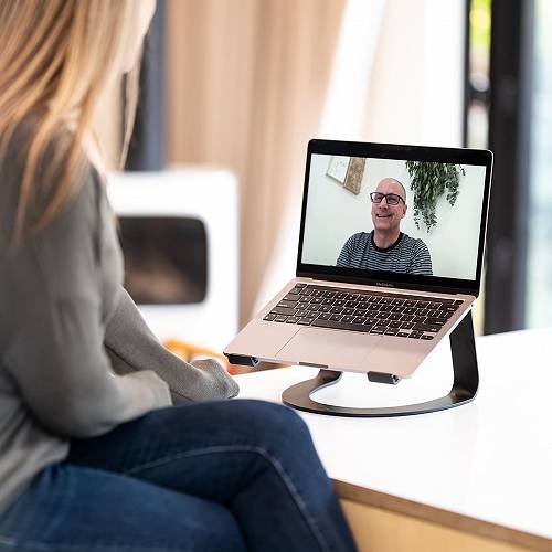 Certified Canadian Recovery Coach Michael Walsh coaching a woman during a secure video call as part of 1-on-1 sober coaching