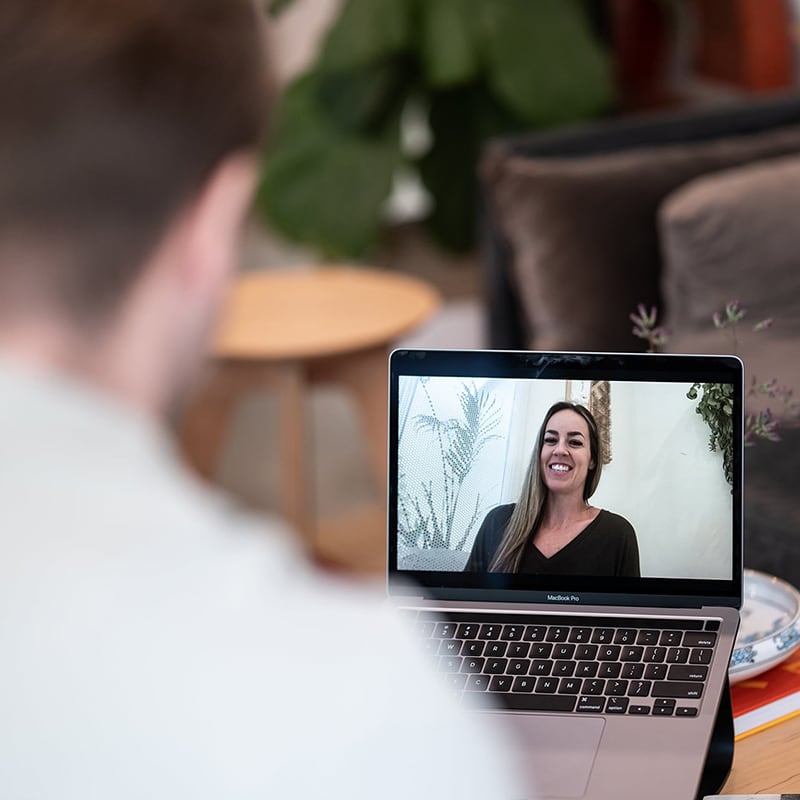 A young man takes part in an online sober coaching session hosted by one of Michael Walsh's team of Certified Recovery Coaches and Canadian Intervention specialists